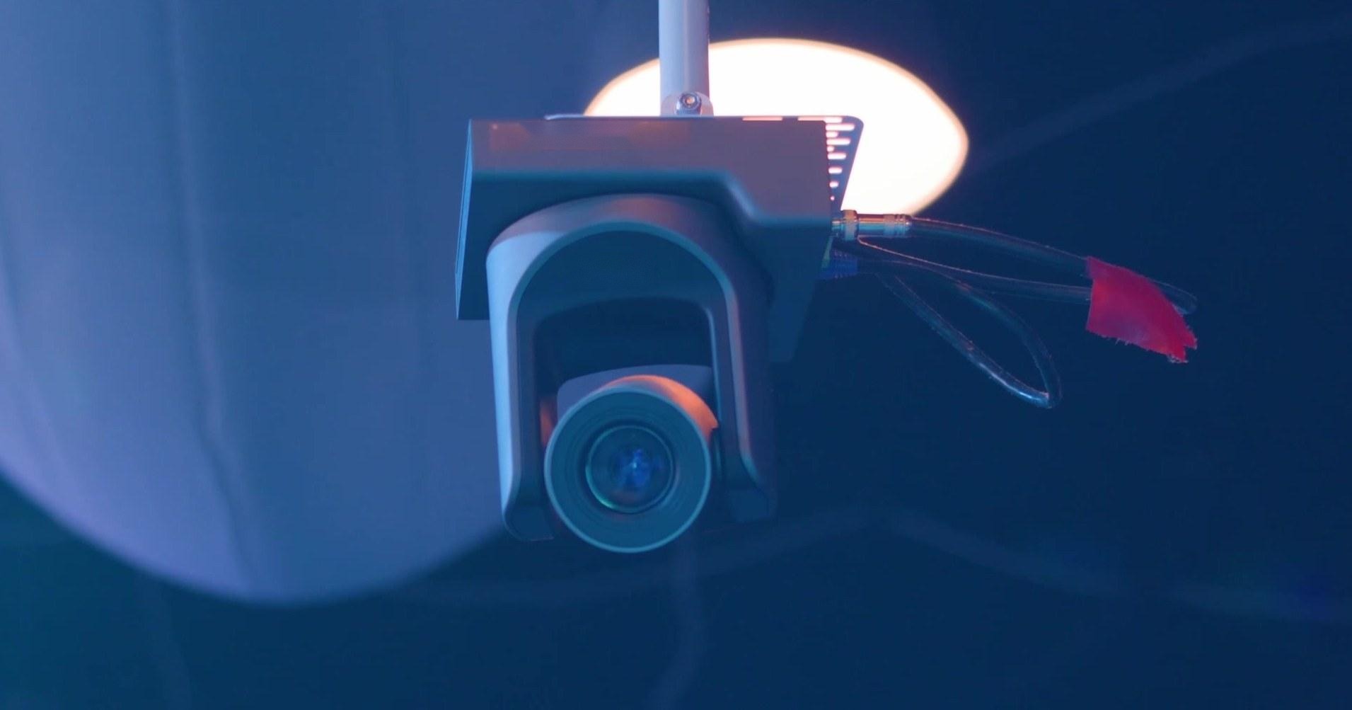 Robotic broadcast camera mounted above the La Familia stage